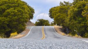 Overtaking and Passing Vehicle at Crest of Grade or Curve in Virginia