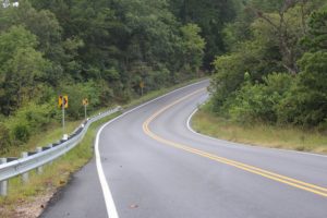 passing at crest of grade or curve on highway in Virginia
